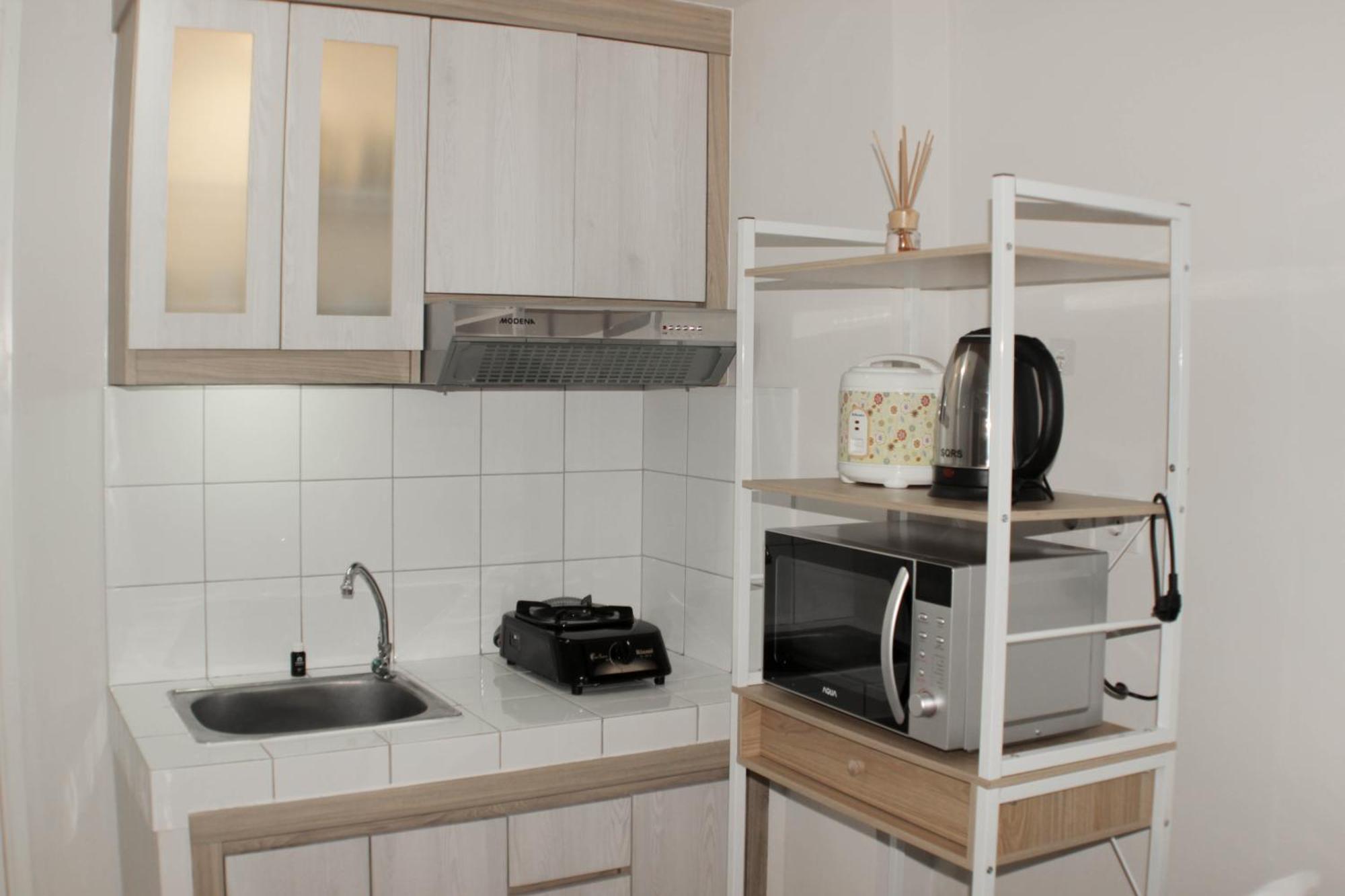 Minimalist And Comfort 2br At Springlake Summarecon By Travelio